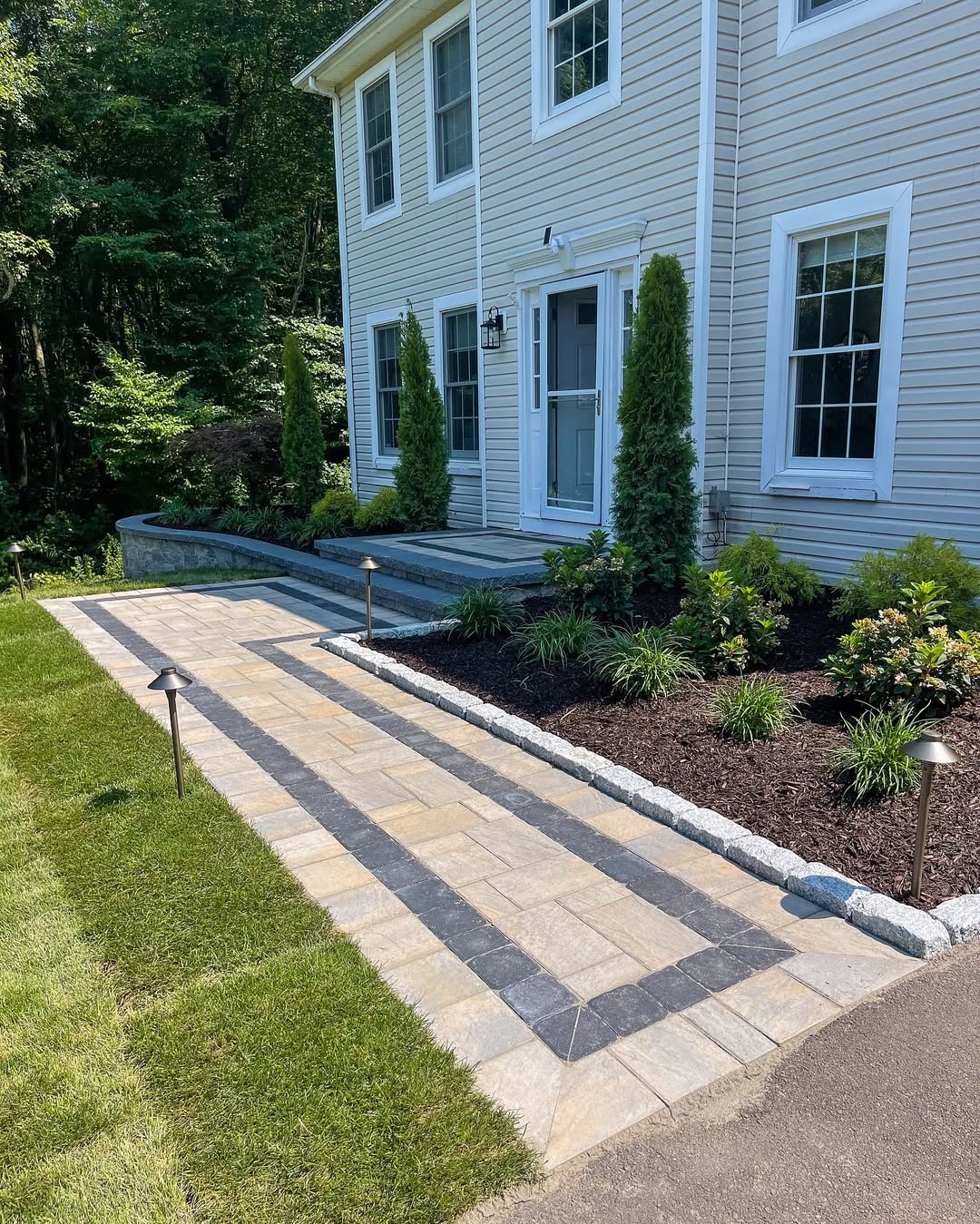 Framed paver walkway & front entry